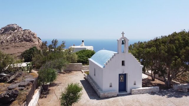 Crane Shot on a Small Church in Naxos Greece, starting from the curch and closing with the beach