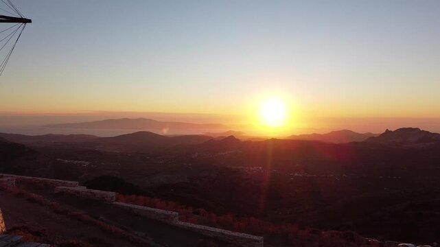 Sunset Calls Loch Shot on a Windmill viewpoint in Naxos Greece