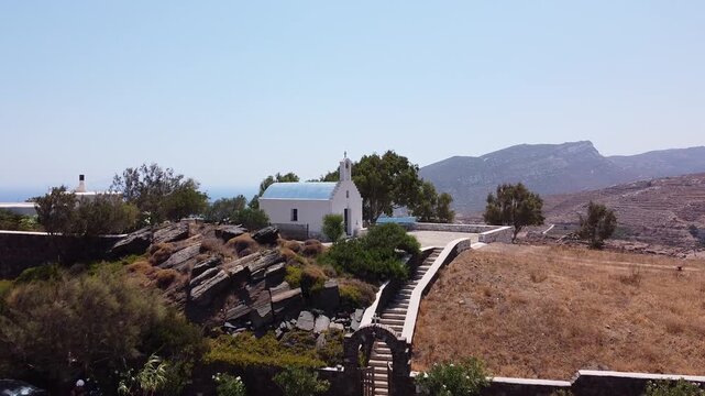 Unveiling Shot on a Small Church in Naxos Greece, starting from the curch and closing with the beach