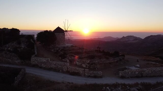 Sunset Push In Shot on a Windmill viewpoint in Naxos Greece