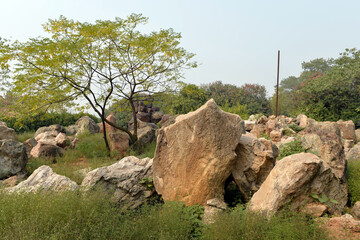Abandoned Copper Mining Site with Ancient Rocks and Green Vegetation © TranPhuoc