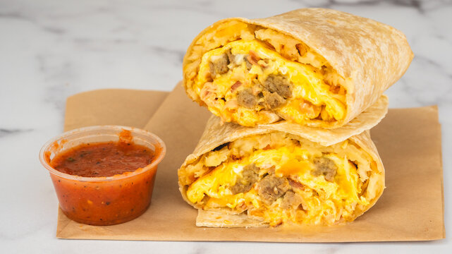 Breakfast burrito with sausage egg cheese and salsa