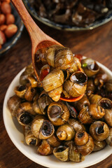 Spicy Guangxi Snails with Ingredients - Traditional Chinese Cuisine © DangThi