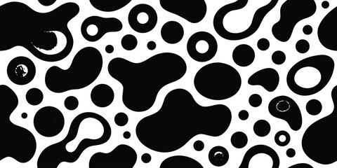 Fototapeta premium Black and white abstract pattern with irregular shapes and spots