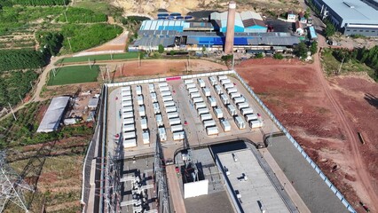 Fototapeta premium Aerial view of an industrial energy storage power station with battery arrays and supporting infrastructure
