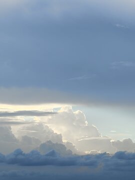 Moody Blue Grey Clouds Backlit by Fading Daylight