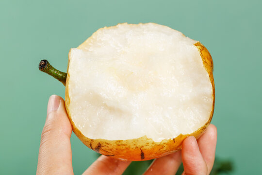Fresh Golden Pear Half with Crisp White Flesh Close-up