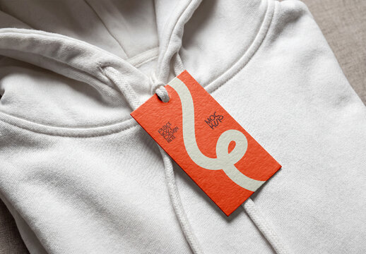 Clothing Hang Tag Mockup on White Hoodie Sweatshirt