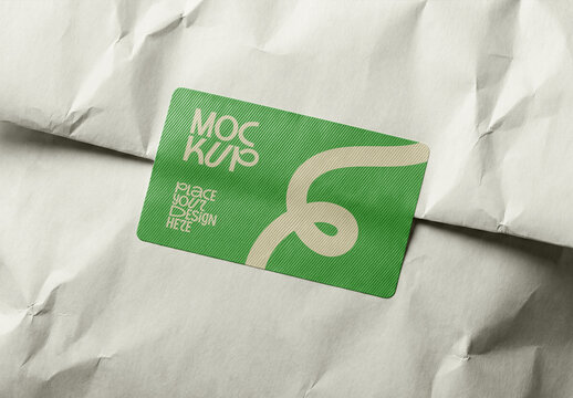 Rounded Rectangle Sticker Mockup on Crumpled Paper Background