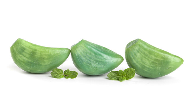 Fresh Green Cucumber Slices with Mint Leaves Isolated on White Background