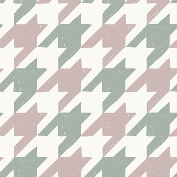 Seamless houndstooth pattern with textured hand drawn sage green and pink checks
