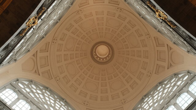 Ornate classical dome ceiling with geometric patterns