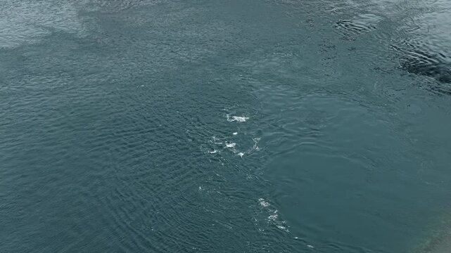 Aerial drone footage of tidal current on the sea near Hirado Bridge, Nagasaki