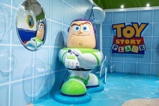 Bangkok,Thailand &ndash; June  15, 2019: Large, glossy Buzz Lightyear statue stands in a vibrant Toy Story themed display.  for the movie Toy Story 5 and displays at the cinema