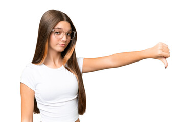 Fototapeta premium Teenager caucasian girl over isolated background showing thumb down with negative expression