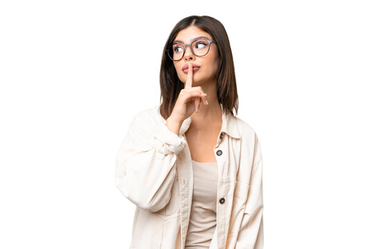 Young Russian woman over isolated chroma key background showing a sign of silence gesture putting finger in mouth
