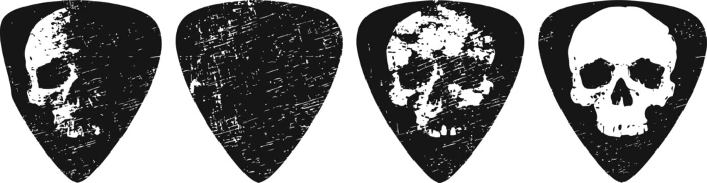Set of four black and white vintage guitar picks with skull designs and distressed textures