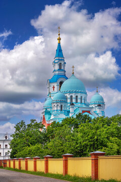 Transfiguration Cathedral on Valaam island, Russia view behind wall. Stone monastery architecture, red brick walls