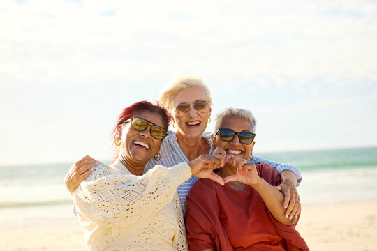 Friends Share Smiles and Joy at the Beach