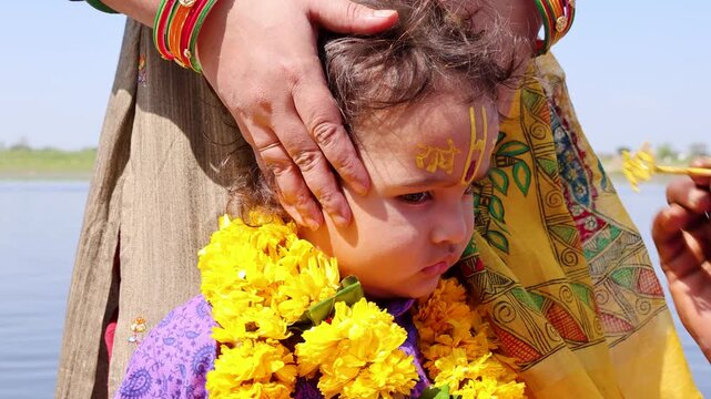 Holy Radhe Tilak Ceremony On Child During Yamuna River Pilgrimage In Vrindavan