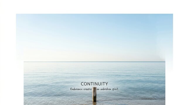 Calm ocean water meets a clear blue sky with a single post