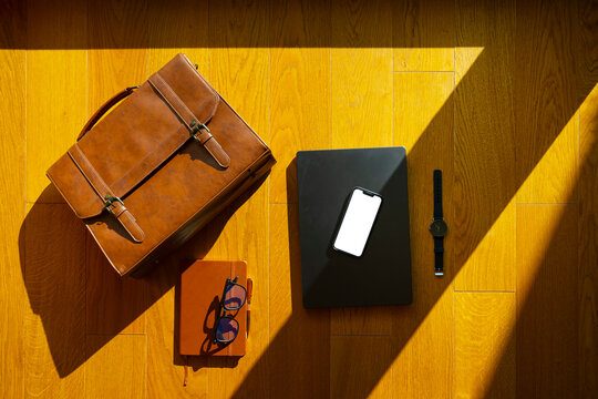 Items on wooden floor in sun light