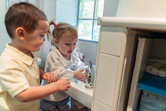 Children learning hand washing daily hygiene routine