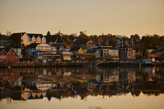 Sunset view of Lunenburg waterfront with reflections on the water