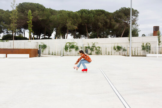 Young Girl Skating on Roller Skates 