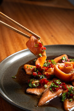 Chopsticks Picking Salmon Sashimi 