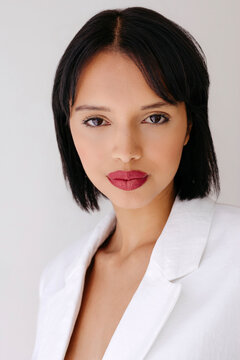 Woman wearing white blazer 