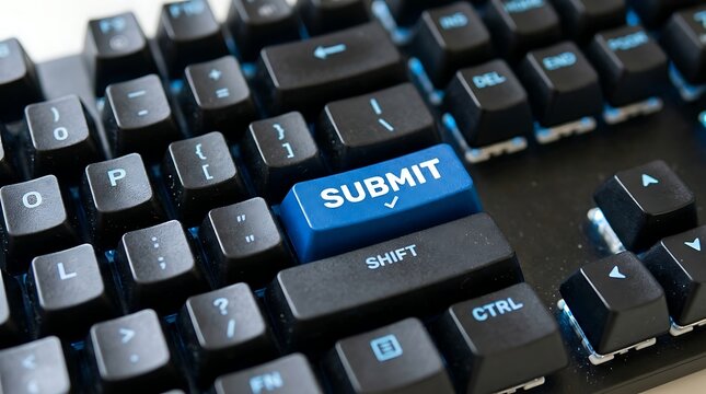 Close-up of a blue SUBMIT button on a mechanical computer keyboard with blue backlight.
