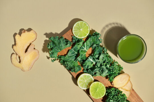 Green juice with kale, lime, and ginger, perfect for detox or wellness