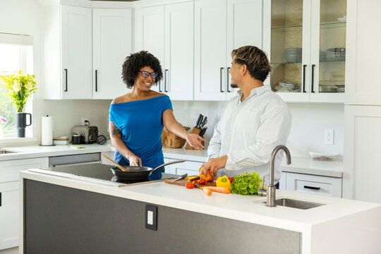 Modern Home Young couple dance  in Kitchen 