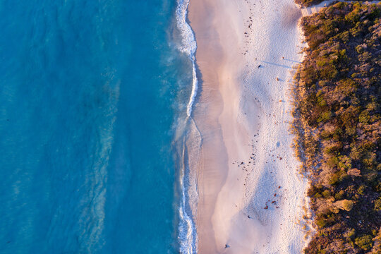 Drone view of waves rolling onto Baileys Beach Tasmania