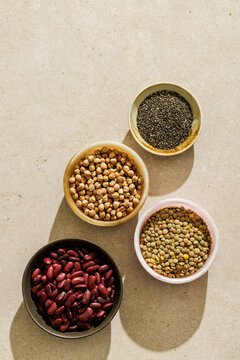 Four bowls with legumes an chia seeds