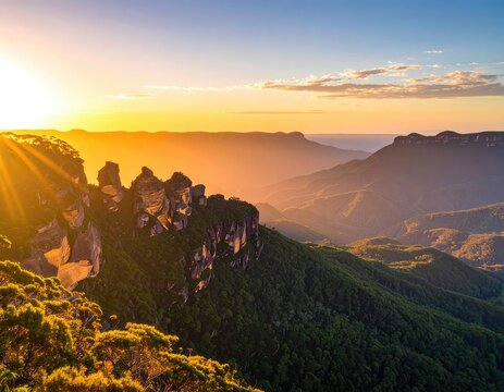 Golden sunrise illuminates the Three Sisters rock formations in the Blue Mountains.