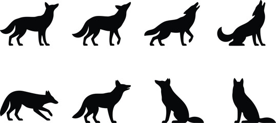 Fototapeta premium Set of black wolf silhouettes showing different poses and movements of wild animals