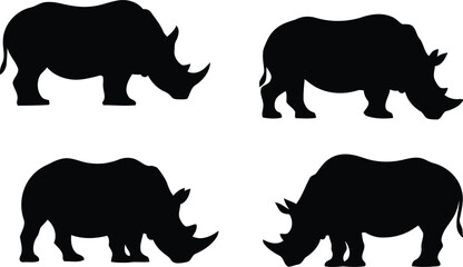Set of four black silhouettes of rhinoceros animals standing in different poses © Milon Store