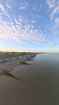 9:16 Vertical 4K Drone Aerial: Old Felixstowe Seafront and Shingle Beach at Sunset