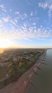 9:16 Vertical 4K Drone Aerial: Old Felixstowe Seafront and Shingle Beach at Sunset