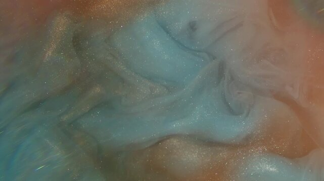 Shimmer paint wave. Mist art. Blur orange blue color cloud glitter fume acrylic rainbow bright texture spreading on abstract creative background.