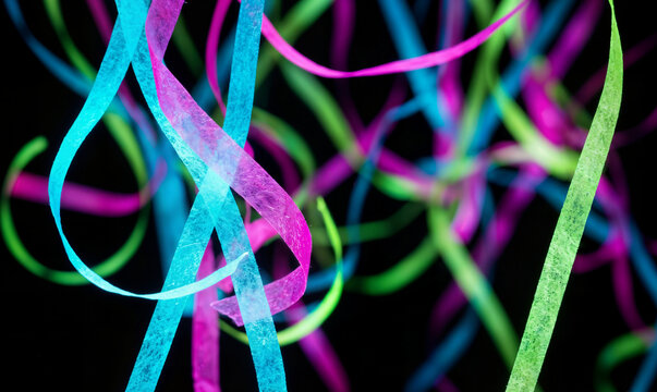 Colorful abstract ribbons swirling and intertwining against black background, vibrant and dynamic motion creating a festive or celebratory atmosphere.