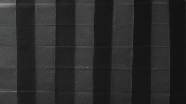Abstract black and grey geometric striped paper texture background
