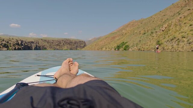 SUP boarding on the lake