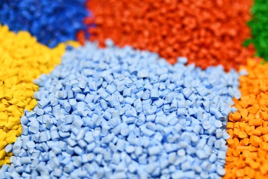 Colourful plastic polymer granules