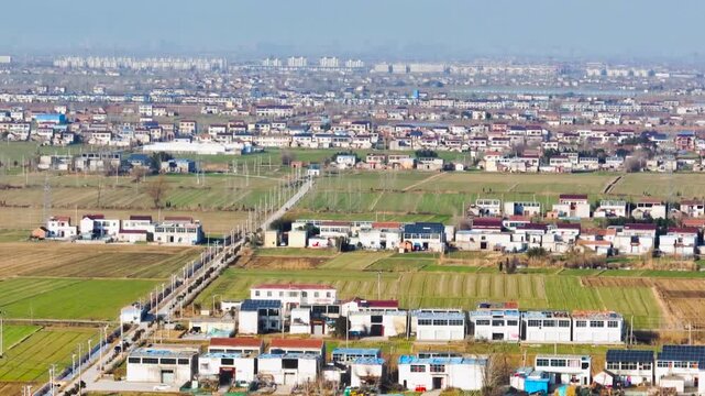 Aerial View of Rural Village Farmland and Suburban Housing