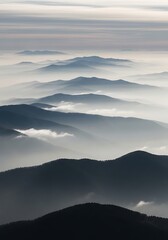 Obraz premium Dramatic aerial view of snow capped mountain peaks.