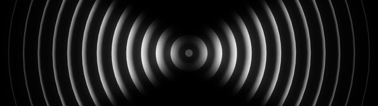 Abstract circular sound waves expanding from center in black and white circles radio signal frequency vibration circles radio signal frequency vibration