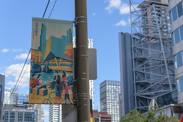 Naklejka premium pole-mounted banner near Sankofa Square at Yonge and Dundas, Toronto